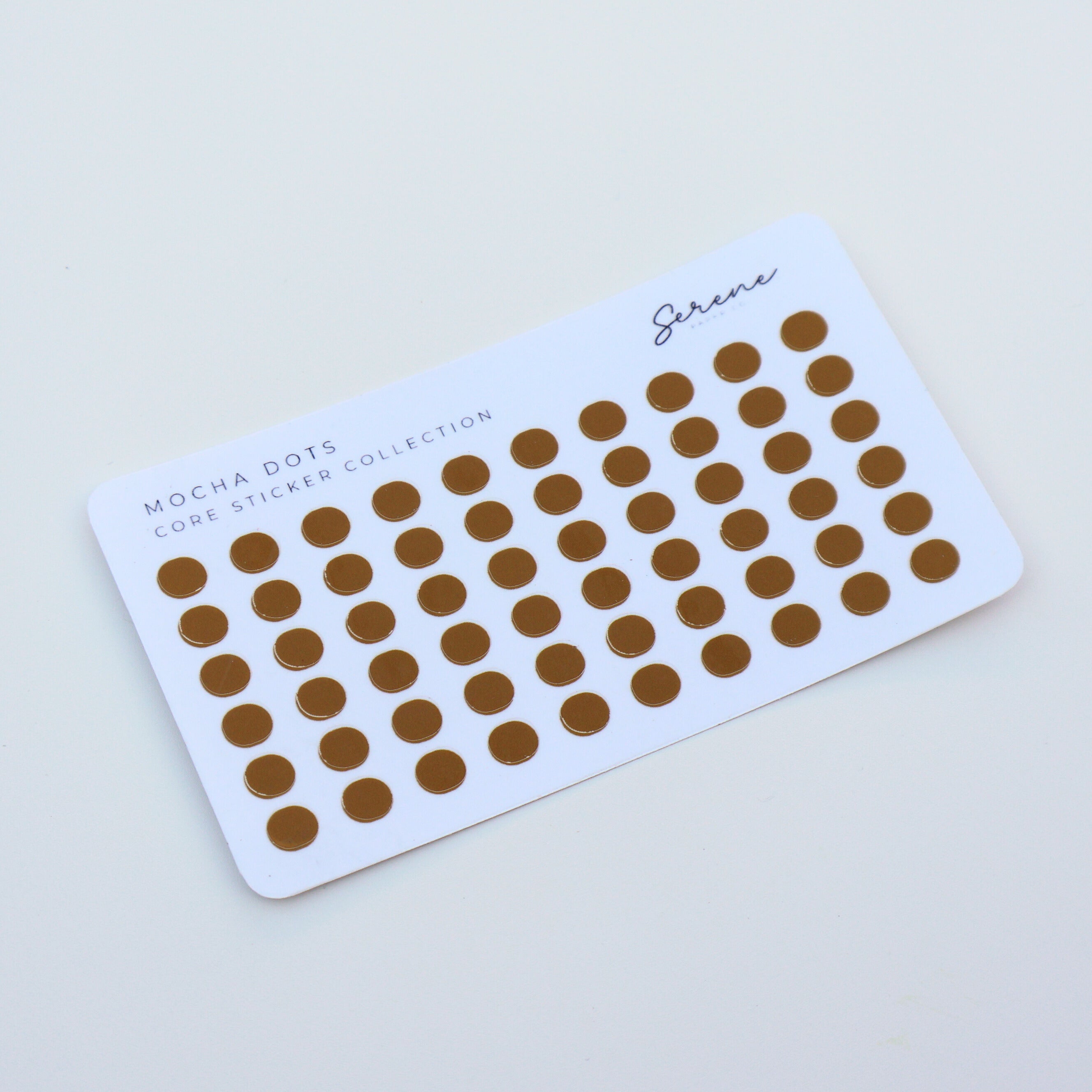 Sheet of brown dots on a white card with 'Mocha Dots' text on a light gray background