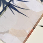 Close-up of a notebook with a pen on a light surface