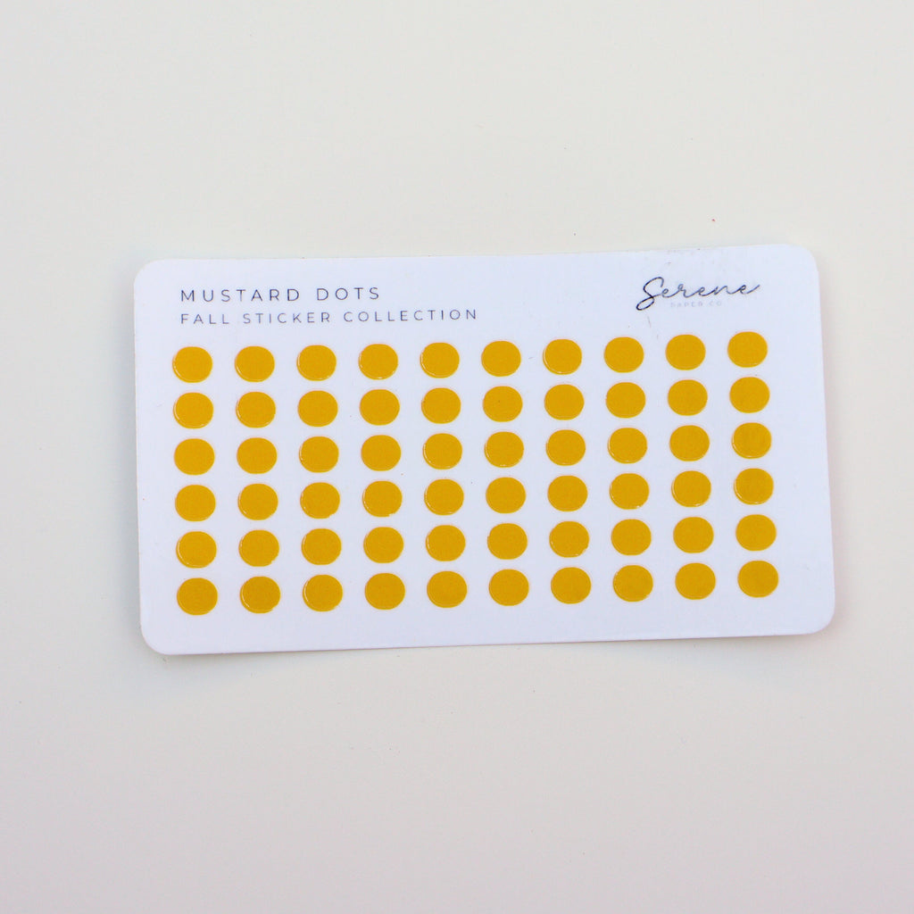 Sheet of mustard yellow polka dot stickers on a white card with 'Serene Paper Co' branding.