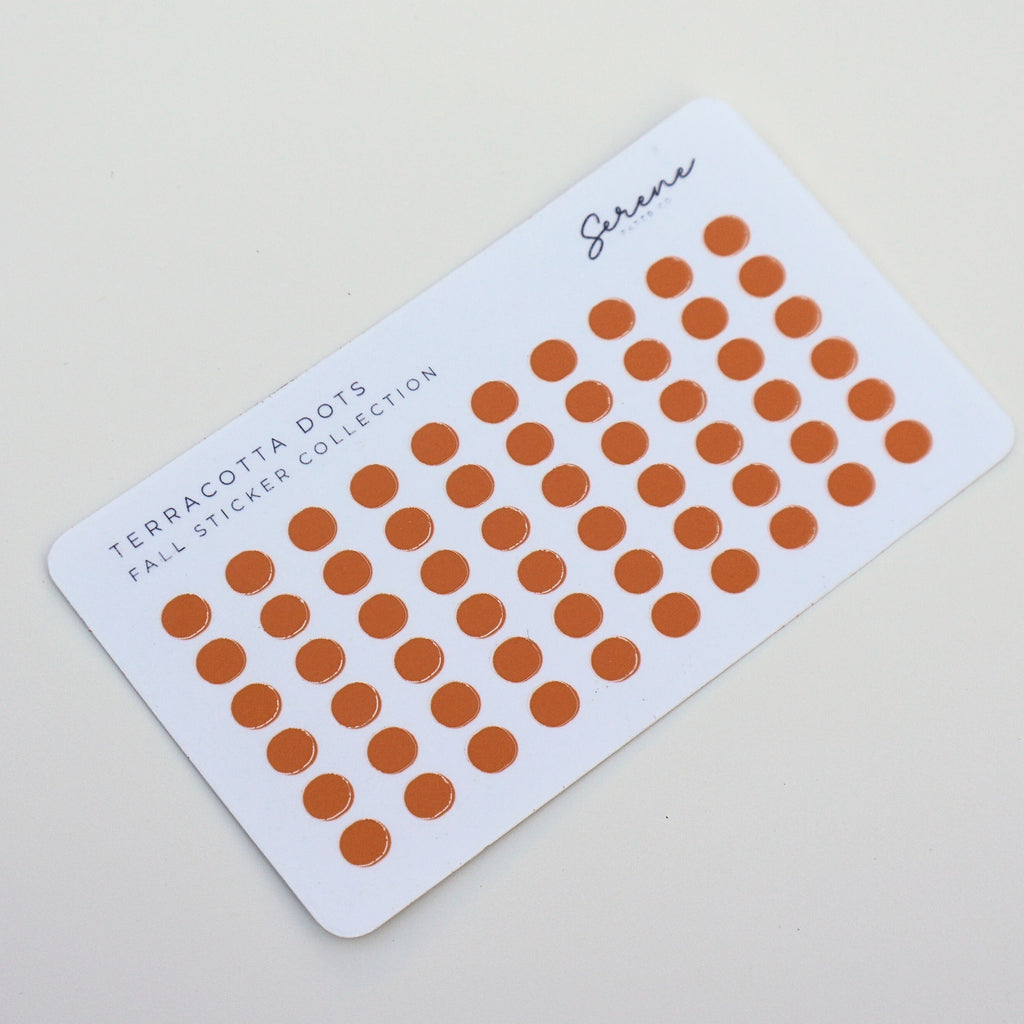 Card with terracotta dots on a light gray background