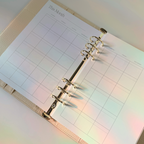 Planner with grid layout on a light background