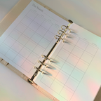 Planner with grid layout on a light background