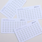 Five white cards with gray polka dots and 'Serene' branding on a light gray background