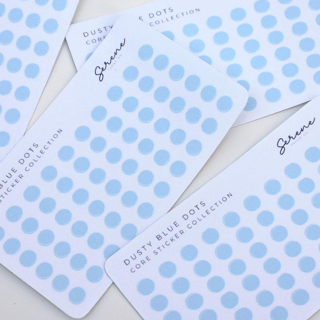Transparent dusty blue polka dot stickers on white cards