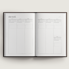 Open planner with weekly schedule layout on a white background